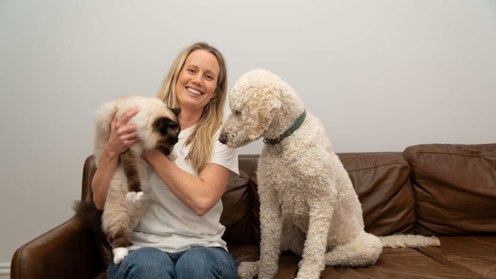 VetChat CEO and Founder Dr Claire Jenkins with her dog Rex and cat ROsie